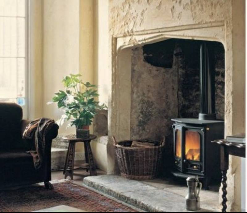 Devis pour faire remplacer une cheminée traditionnelle par un poêle à bois design et moderne Saint André de Cubzac et ses environs